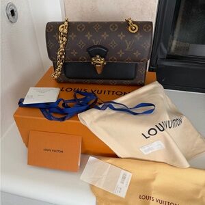 Louis Vuitton Victoire Shoulder Bag Authentic